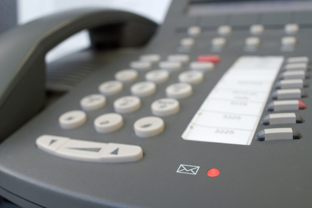 voice mail light glows on business phone